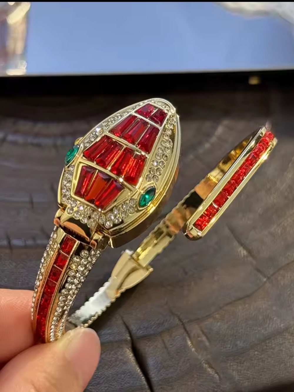 & Other Stories Gold Bracelet with Red and Emerald Stones watch